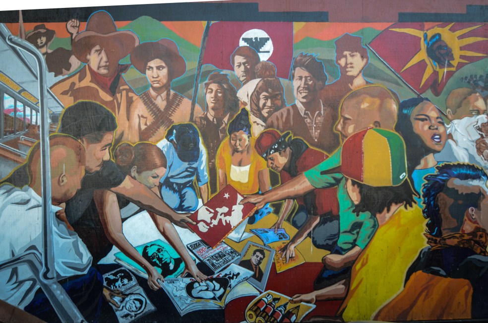 Murale che rappresenta un incontro di un gruppo di attivisti. Si possono riconoscere alcuni personaggi come...