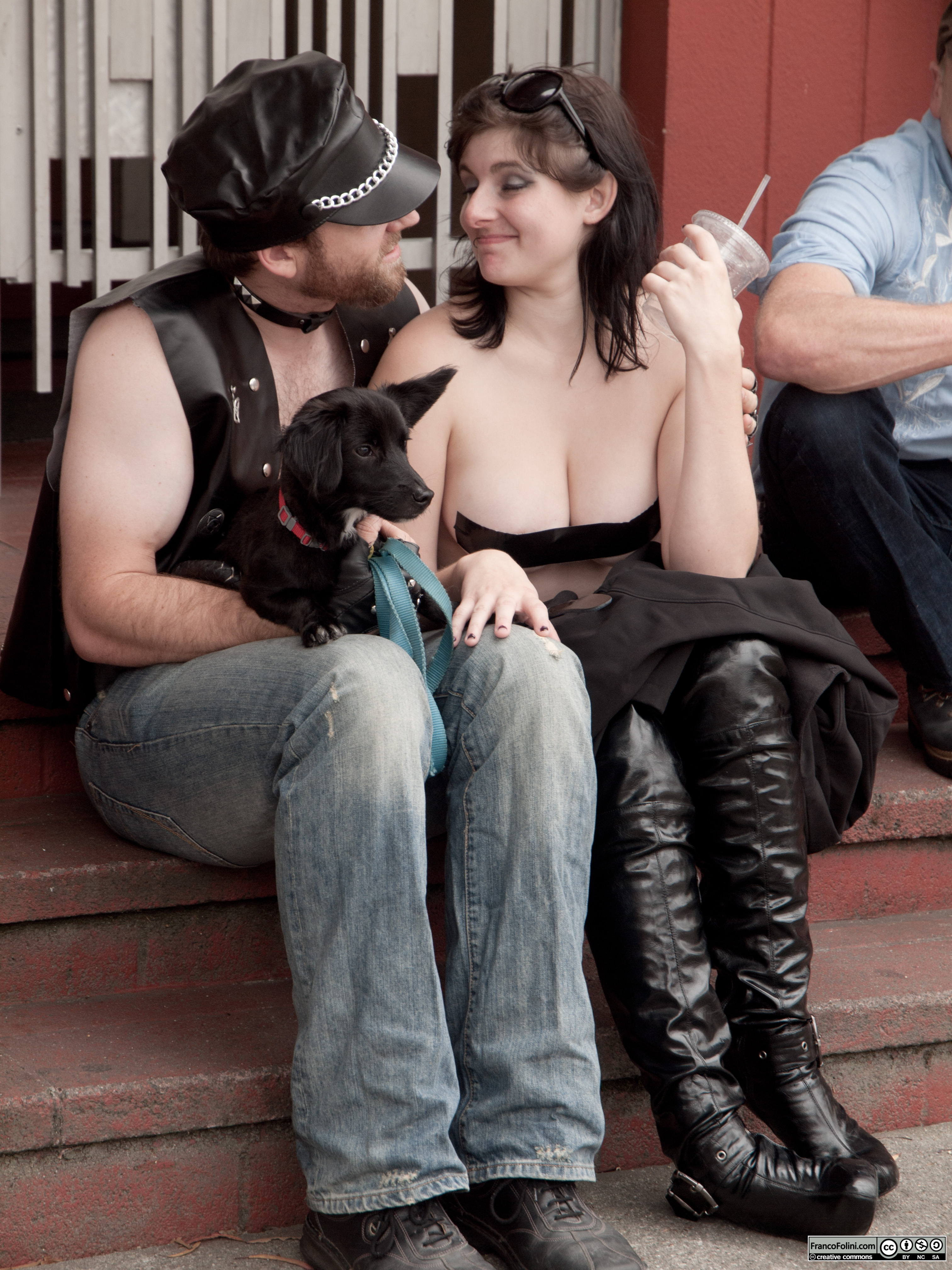 San Francisco Folsom Street Fair: couple with dog