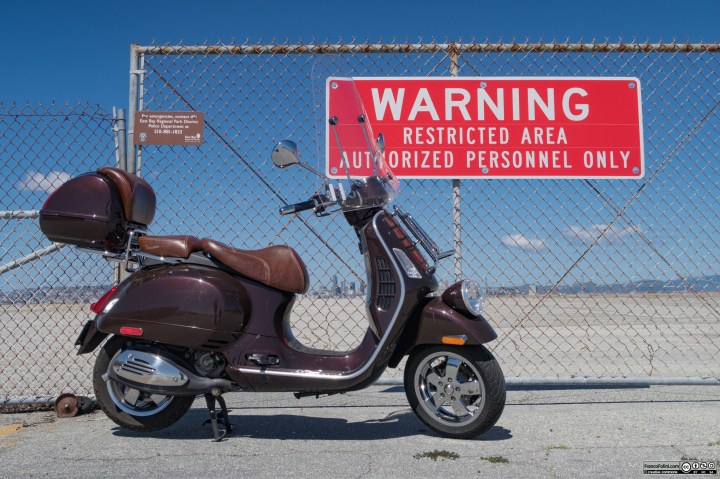 The Vespa at the entrance of the old, and now closed, Alameda military airport. California