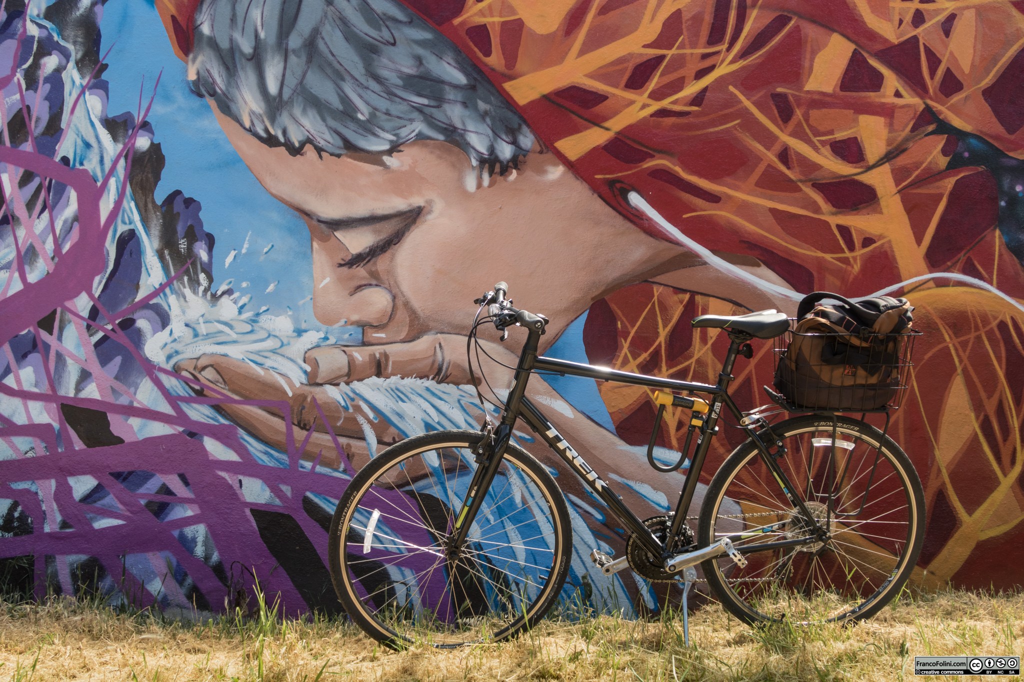 Bike and mural (mural by American-Chilean artist Cristian Muñoz)