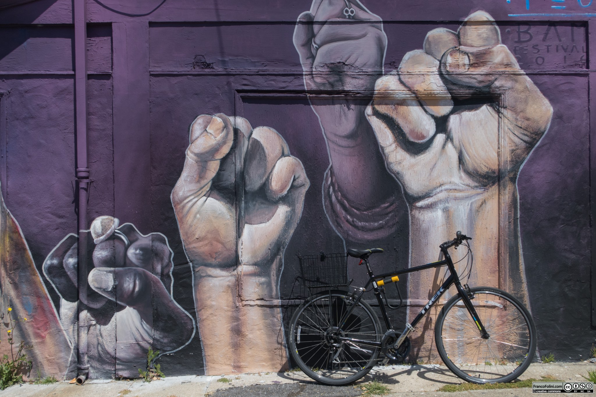 Bike and mural (mural by Chilean muralist Teo Doro) in Berkeley, CA