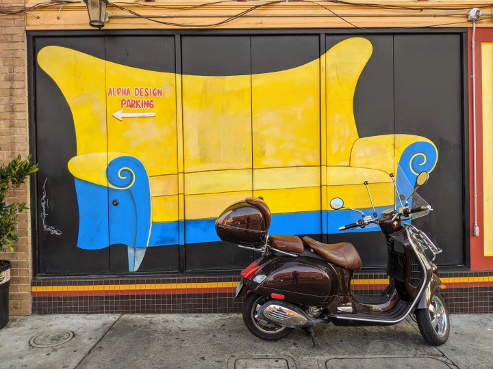 University Avenue, Berkeley: mural with a couch on the walls of a furniture shop, Alpha Design.